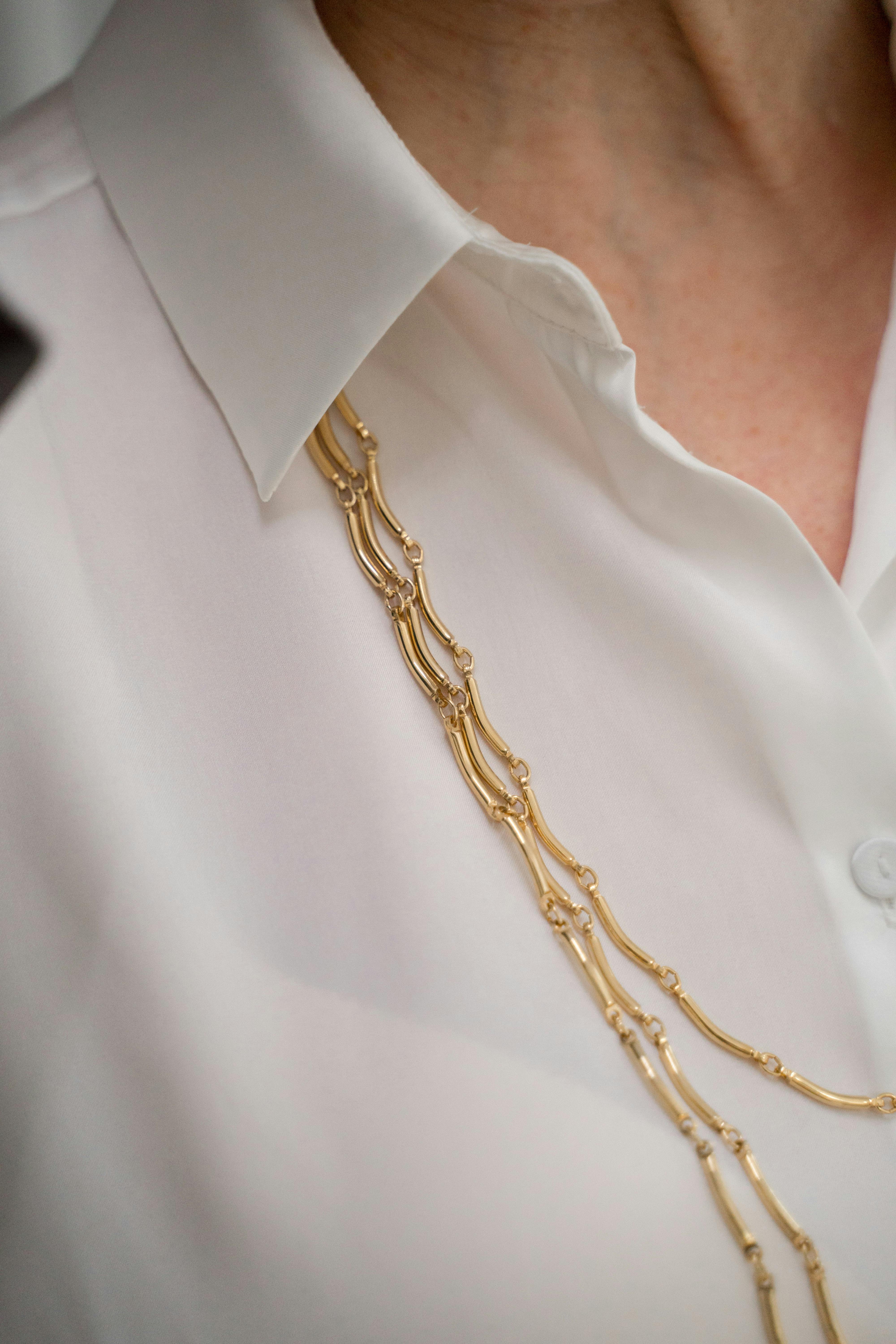 necklace and shirt on an elderly woman