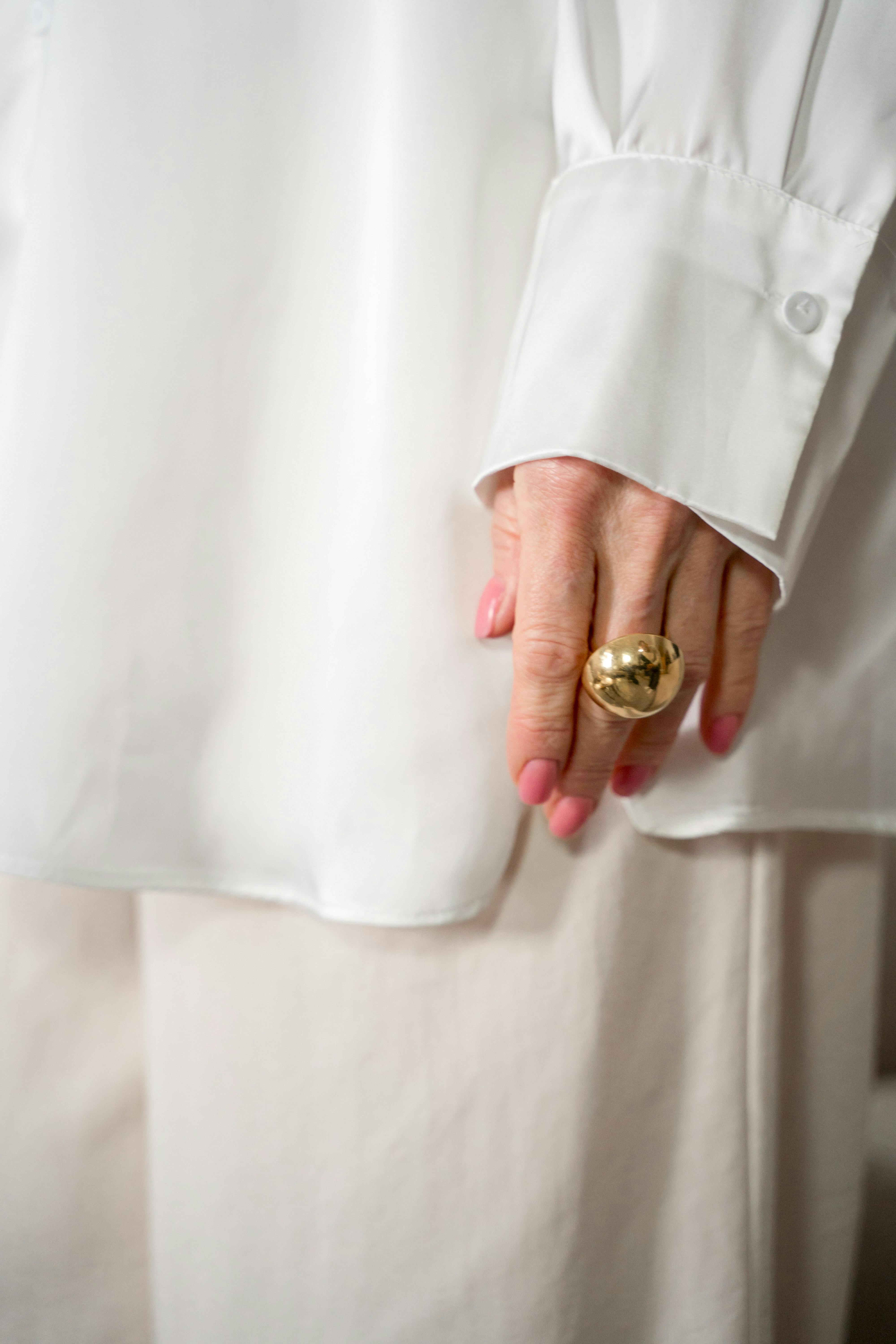 hand with gold ring