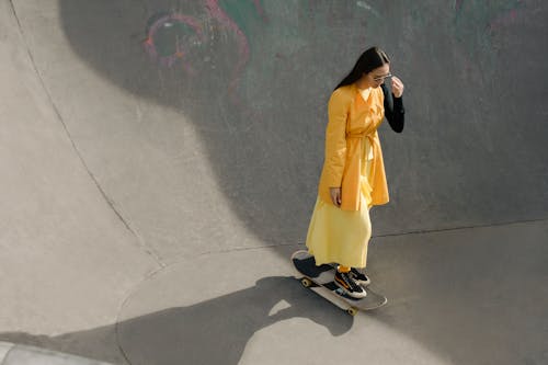 Brunette Woman with Roller Skates · Free Stock Photo