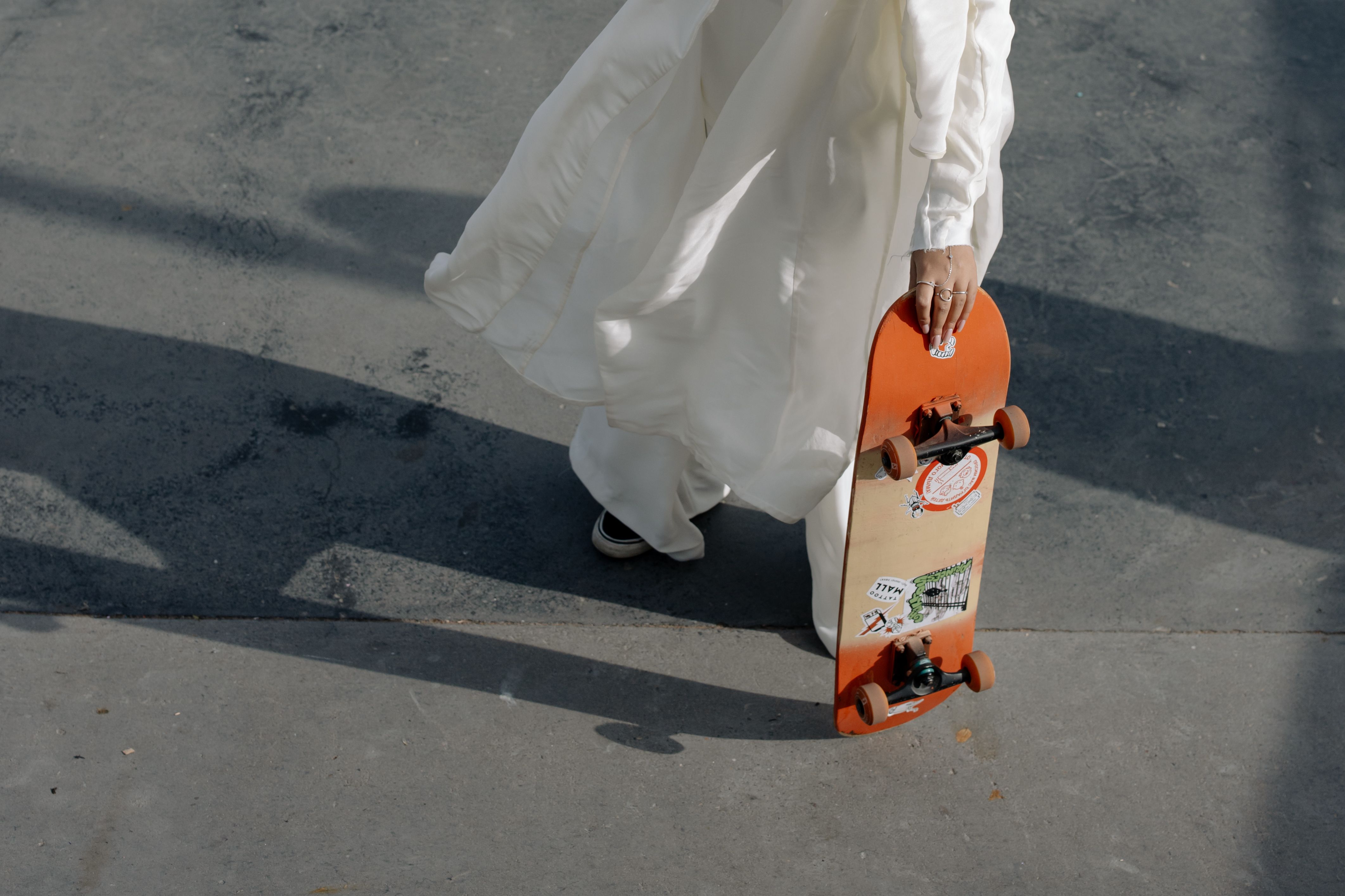 A Woman Skateboarding in Her Yellow Dress · Free Stock Photo