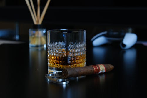 Cigar near Glass of Whisky