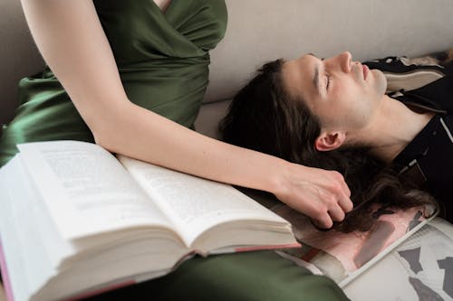 Woman Touching Sleeping Mans Hair