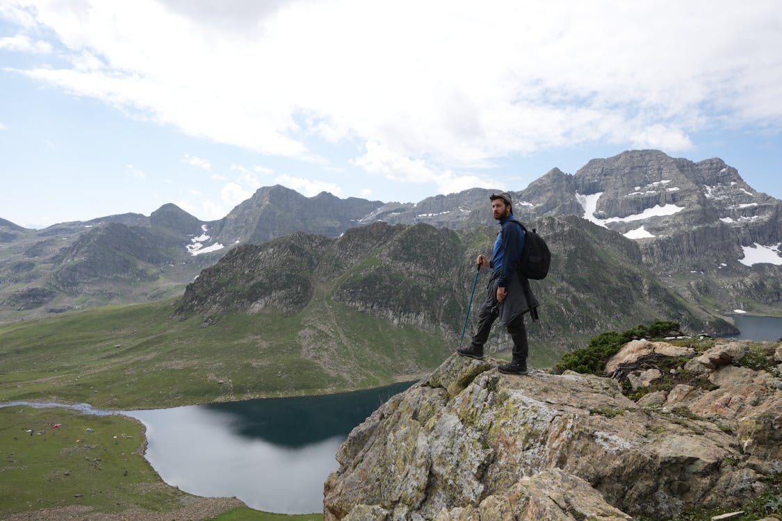 A Man Exploring the Mountains