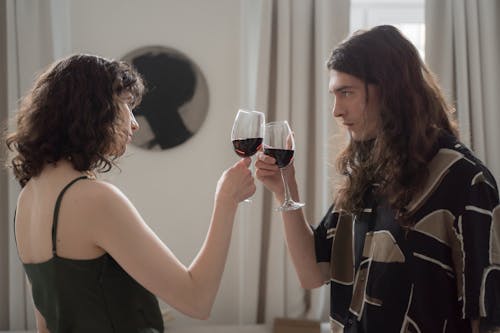 Man and Woman with Wine Glasses