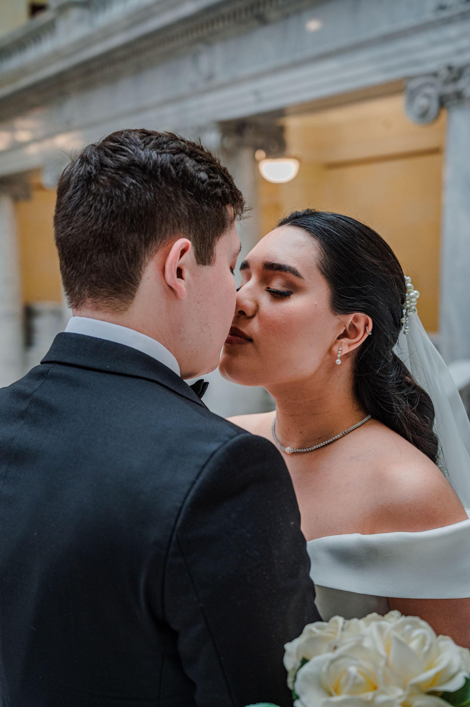 Intimate wedding kiss