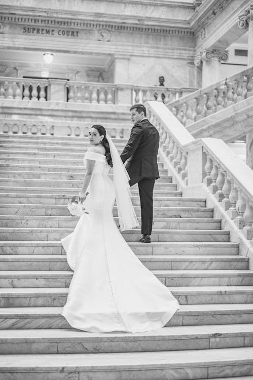 Married Couple Going Up the Stairs · Free Stock Photo