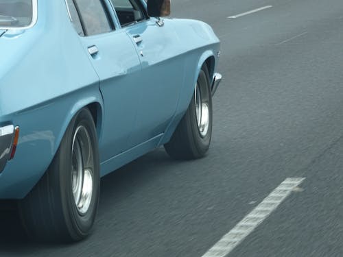 Foto profissional grátis de automóvel, azul claro, carregador de tacos de golfe