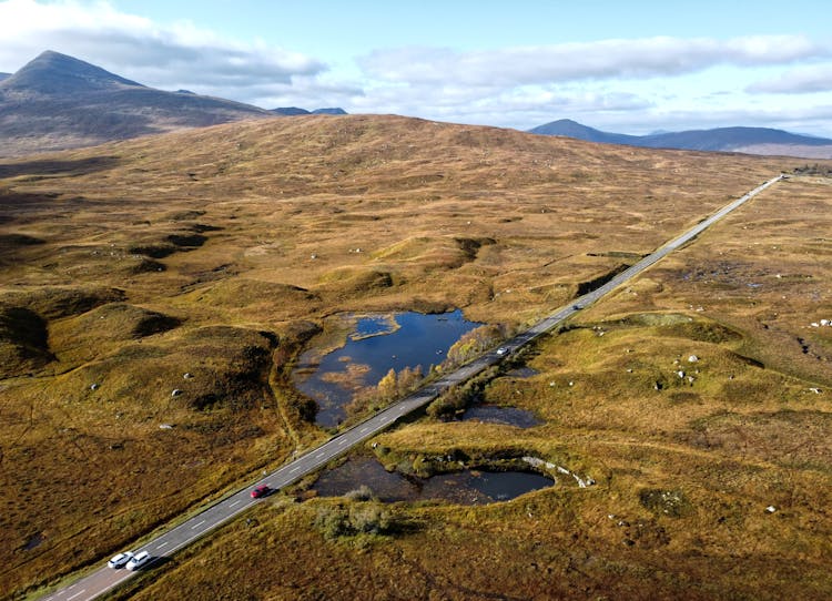 Aerial View Of Highway Crossing Lake