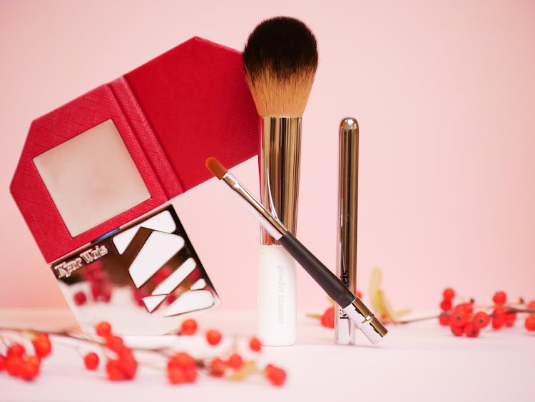 Makeup Brushes On Pink Background 