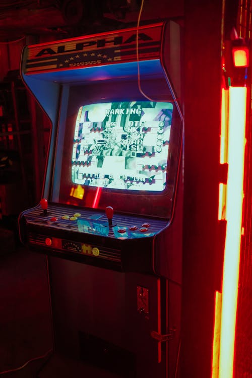 Screen and Dials of an Arcade Game