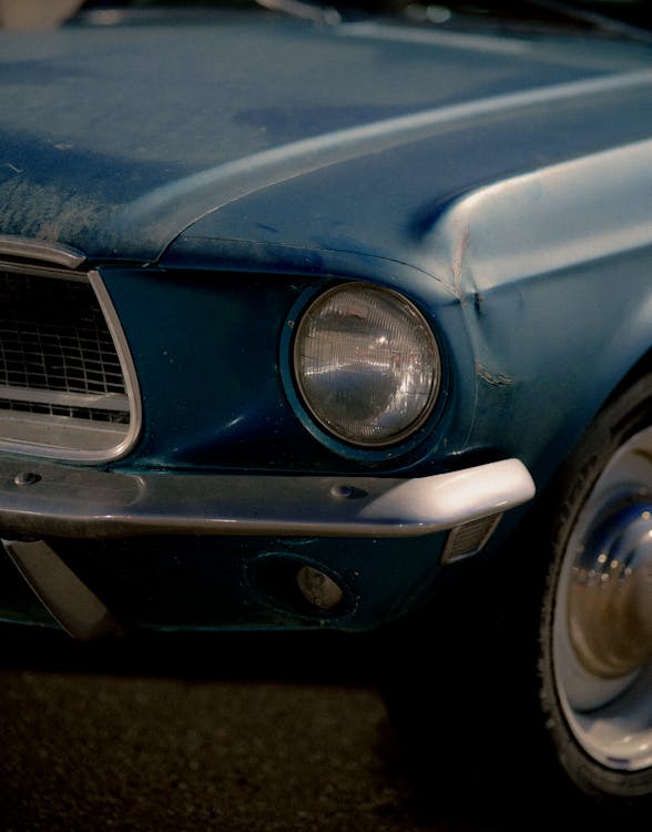 Headlight of a Blue Car