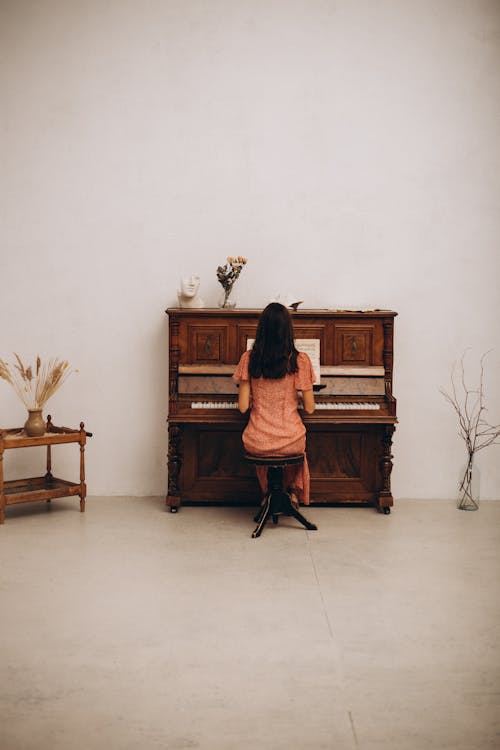 Free Woman Playing Piano Stock Photo