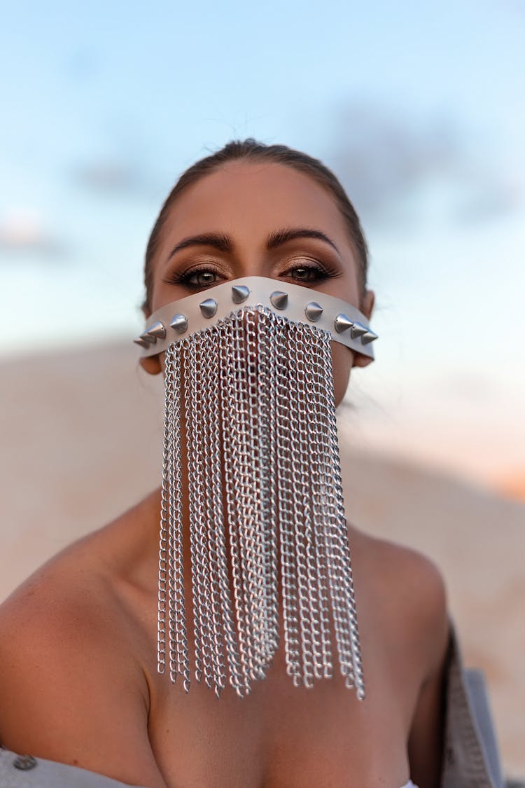 Woman Wearing Face Veil Made Of Chains