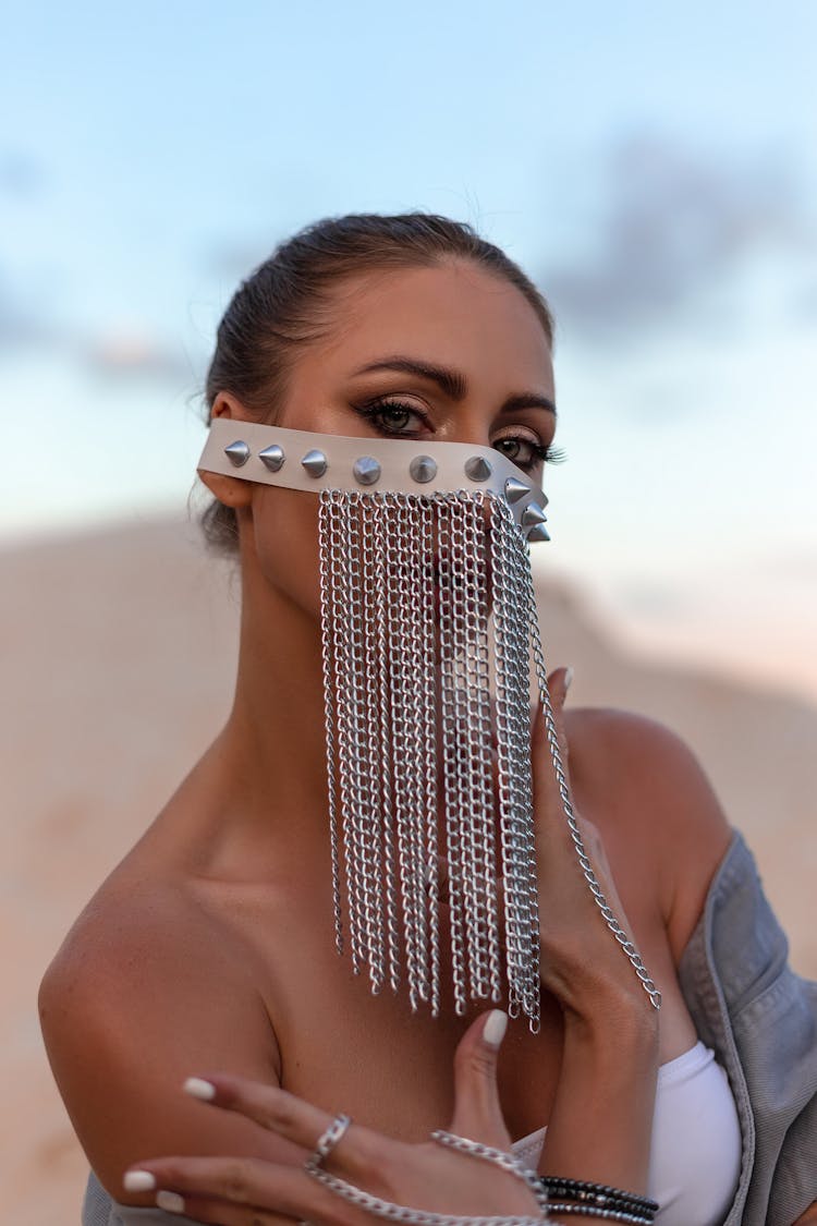 Woman In Face Veil Made Of Chains