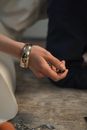 Close-up of Woman Hand Holding Black Dice
