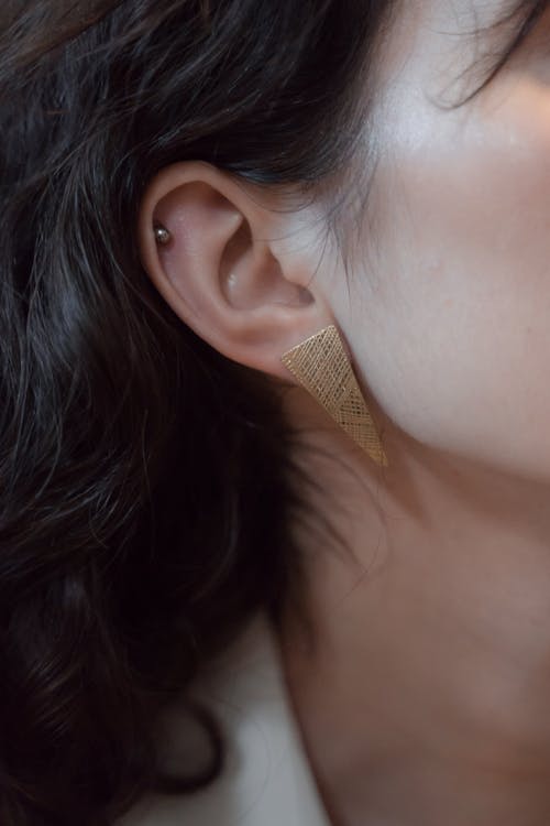 Close-up of Ear with Triangle Shaped Earring