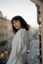 Bohemian Young Woman Standing on Balcony