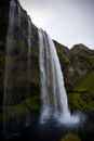 Waterfalls on Green Grass Covered Hill