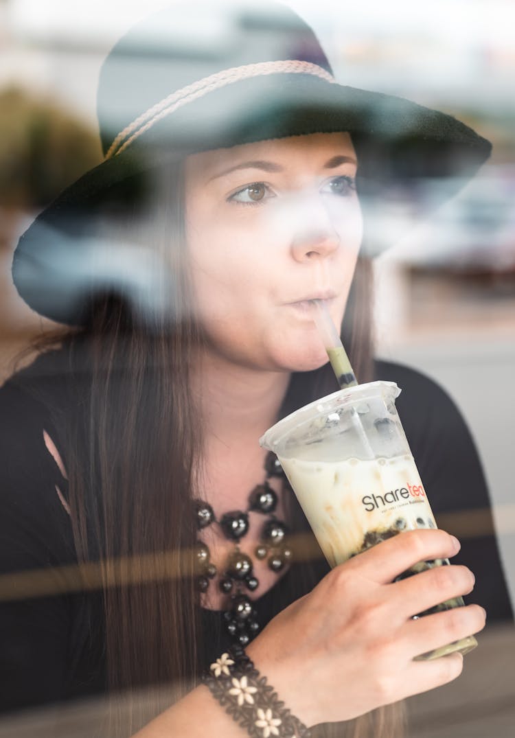 A Woman Drinking Coffee