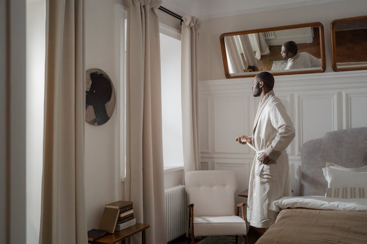 A Man Wearing A Bathrobe