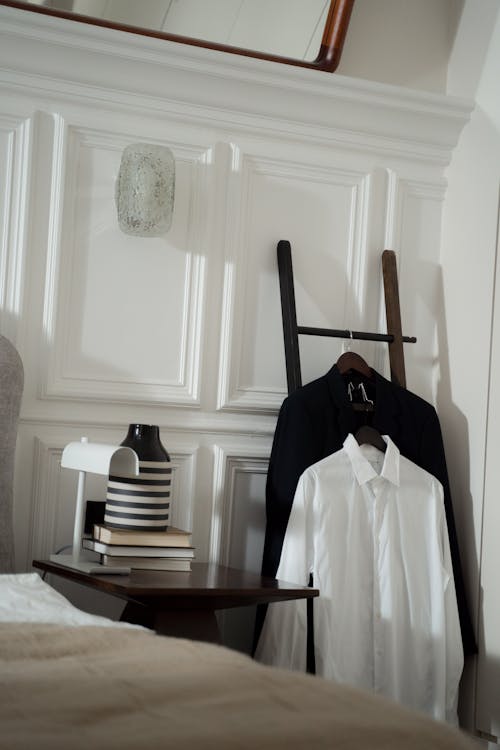 Suit and Shirt Hanging in Bedroom 