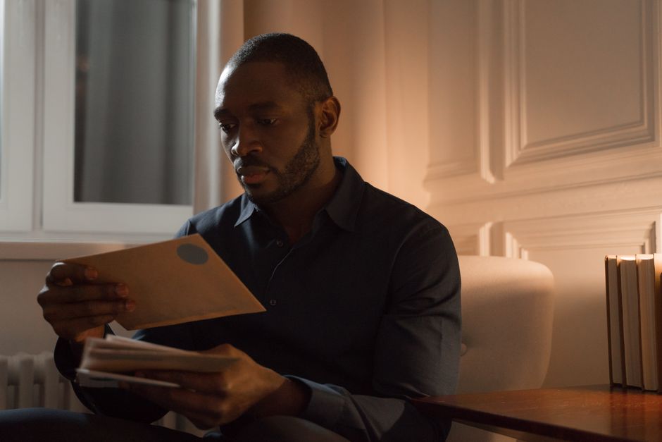 person reading denial letter