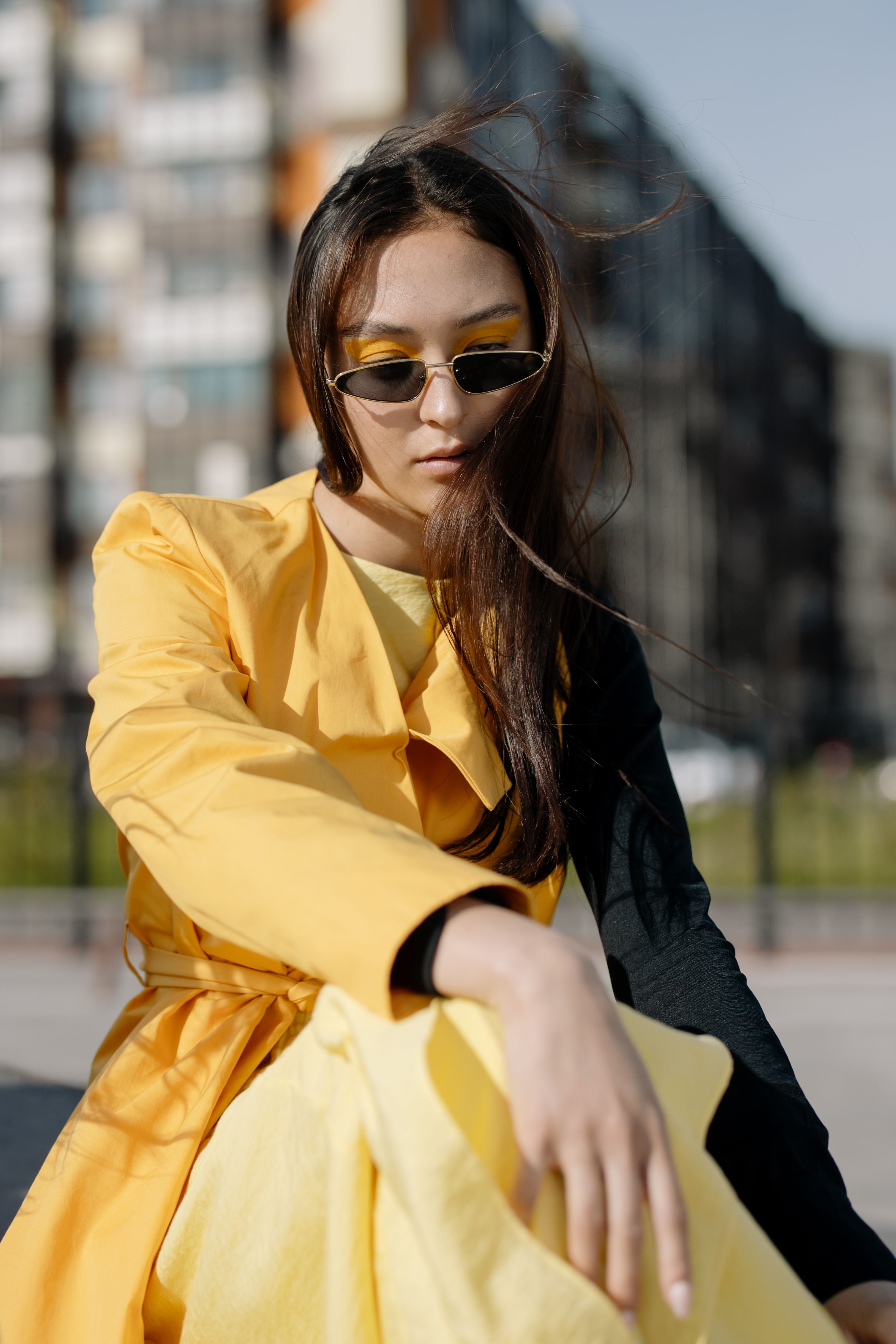 Stylish Woman Wearing a Yellow Dress and Sunglasses · Free Stock Photo