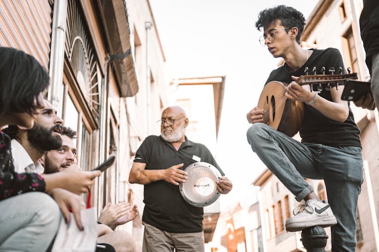 People Singing Together On The Street