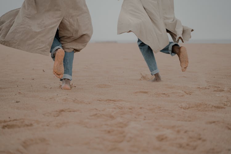 Men Running On Beach 