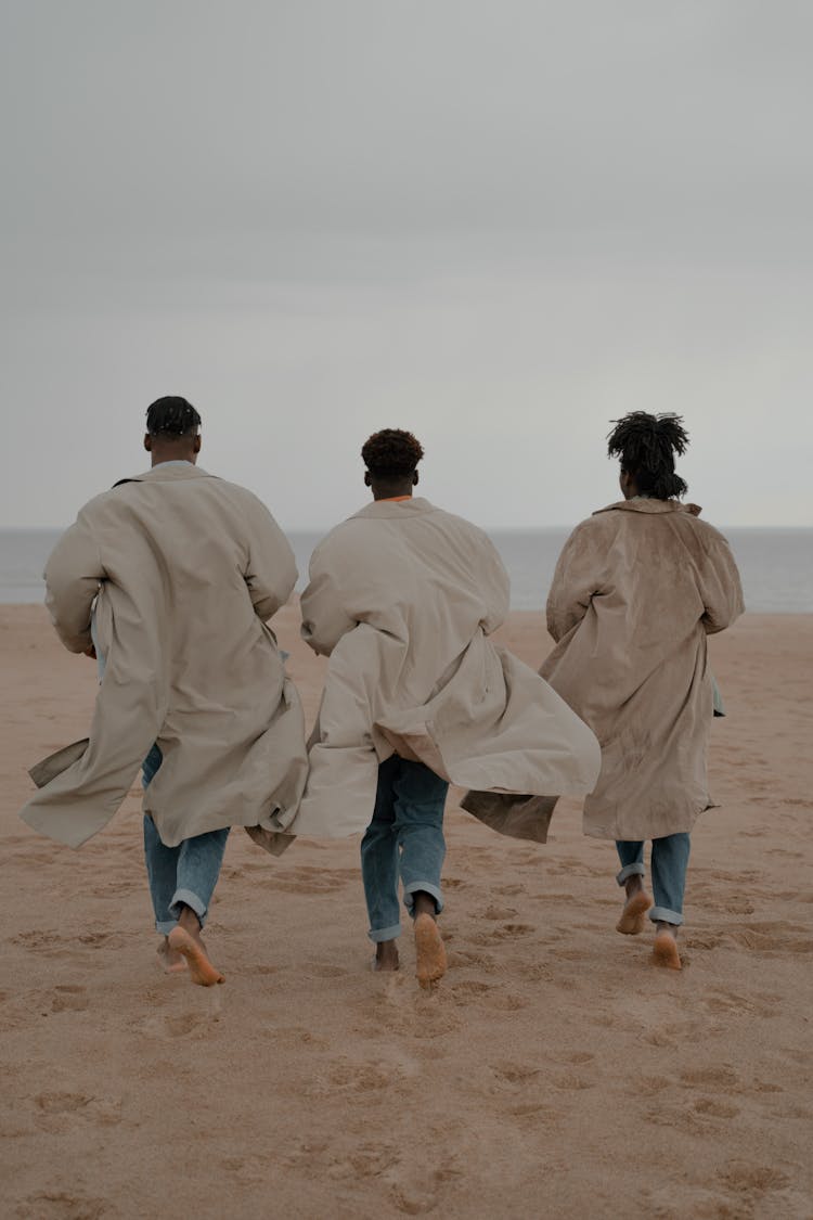 Men Running On Beach