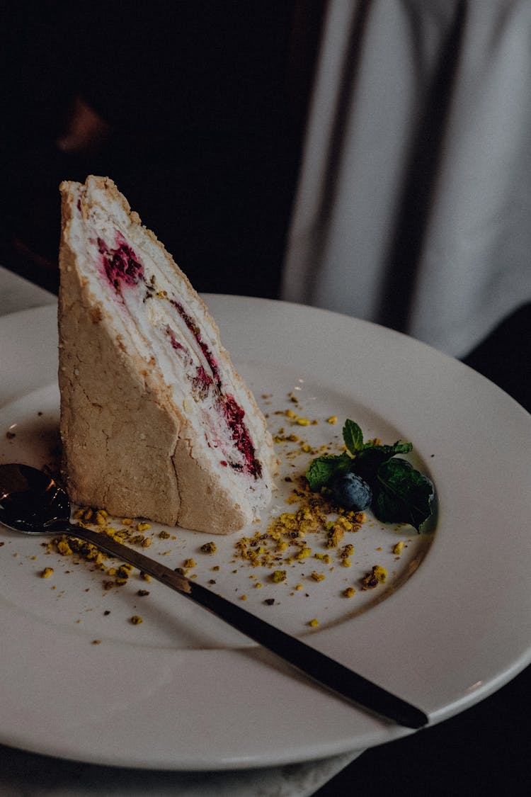 Slice Of Cake On A Ceramic Plate