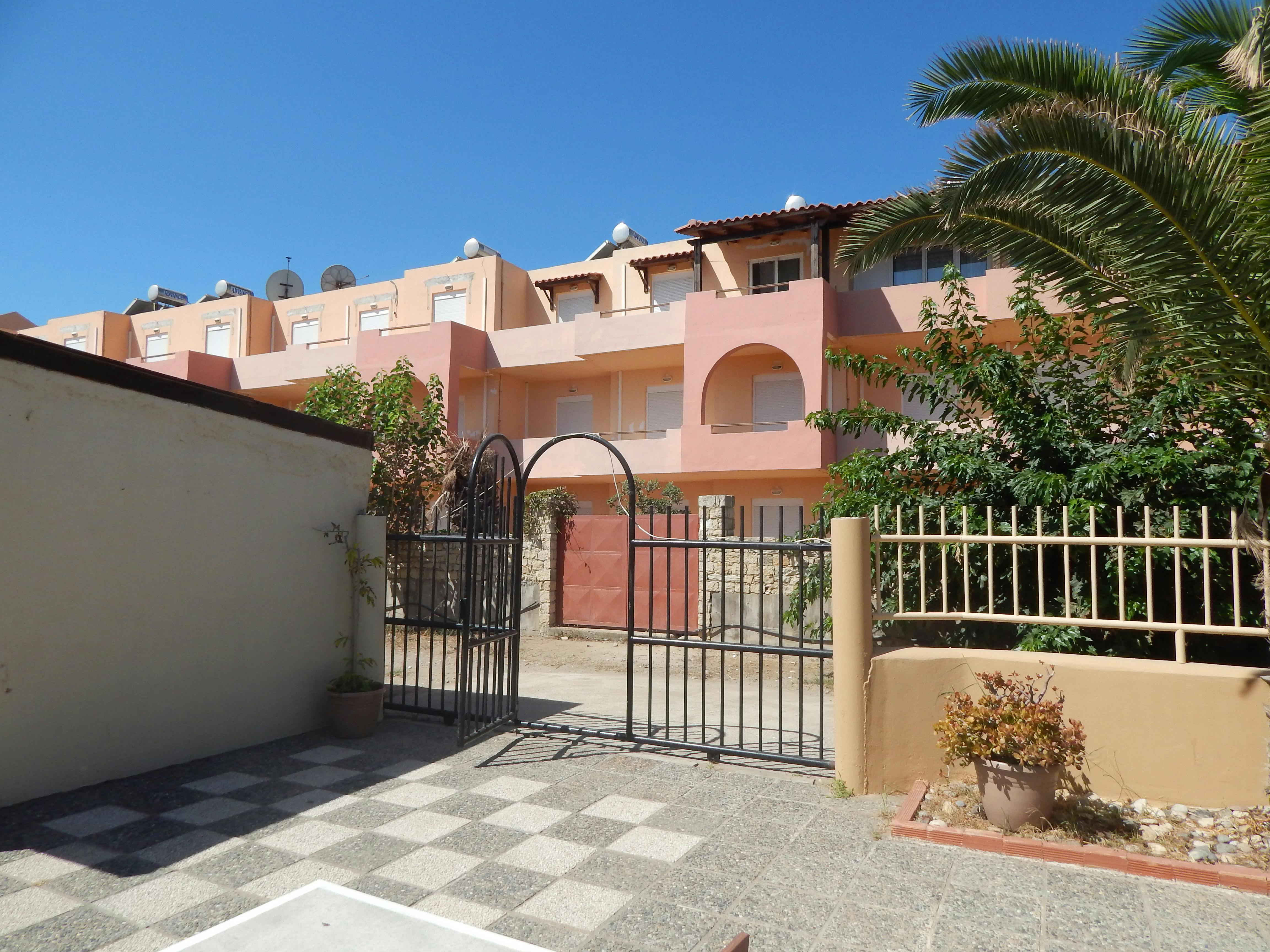 A wide variety of coloring books displayed on a shelf in a bookstore.