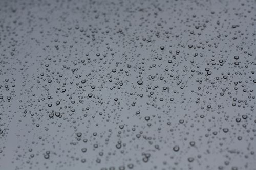 Free Detailed view of water droplets on glass, showcasing texture and clarity. Stock Photo