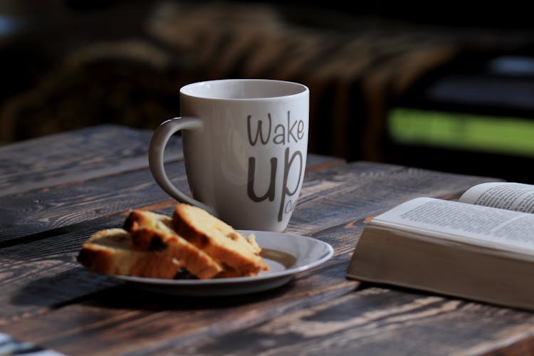 Breakfast On The Table Near A Book