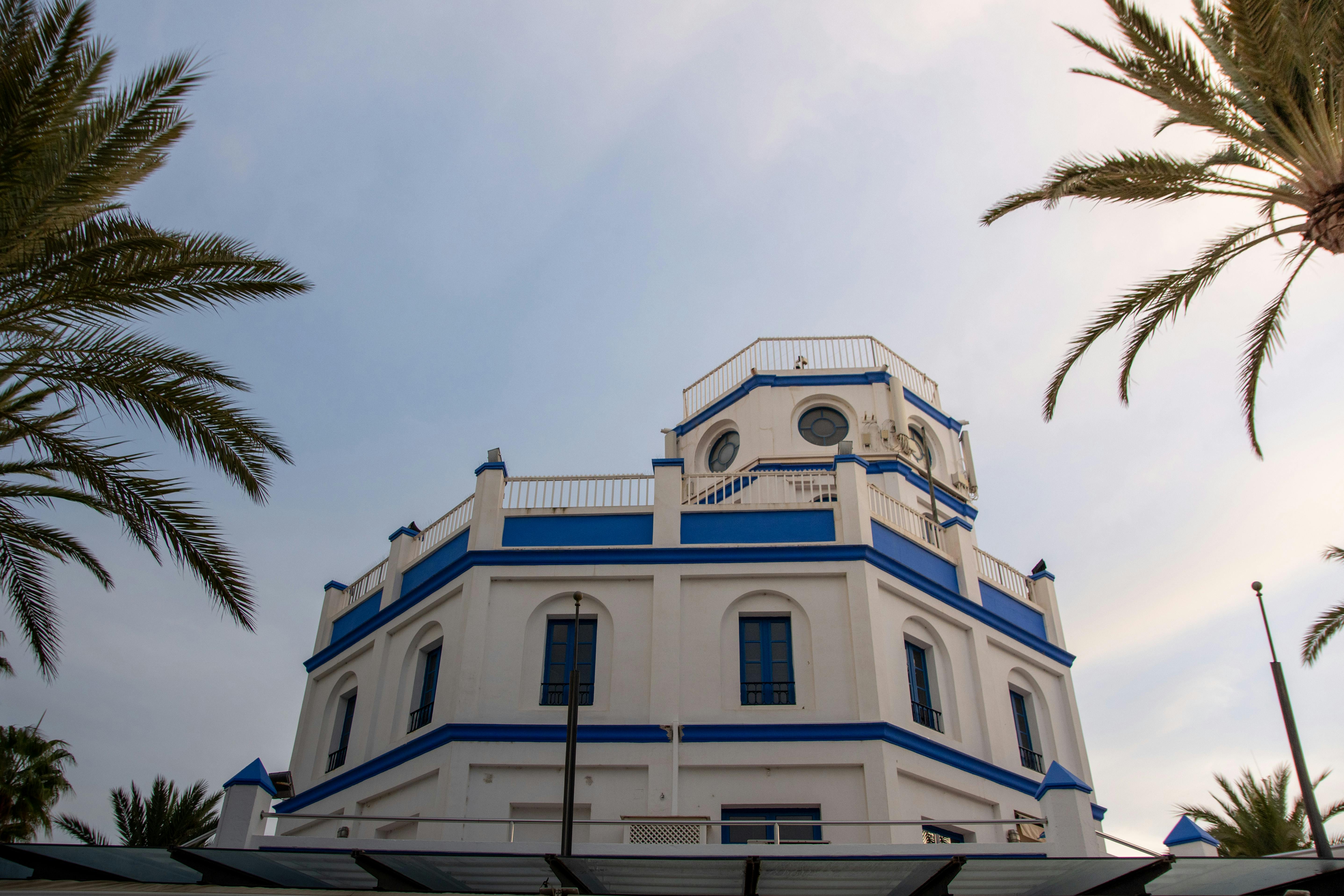 low angle shot of white and blue concrete building