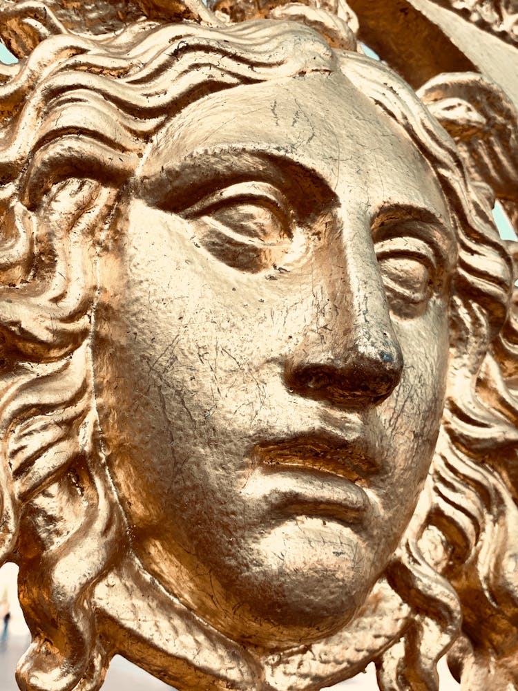 Gold Relief Of Face