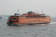 A Staten Island Ferry Cruising with Passengers on Sea