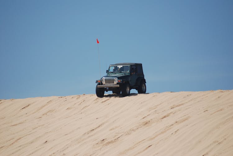 Black Jeep Wrangler On Desert