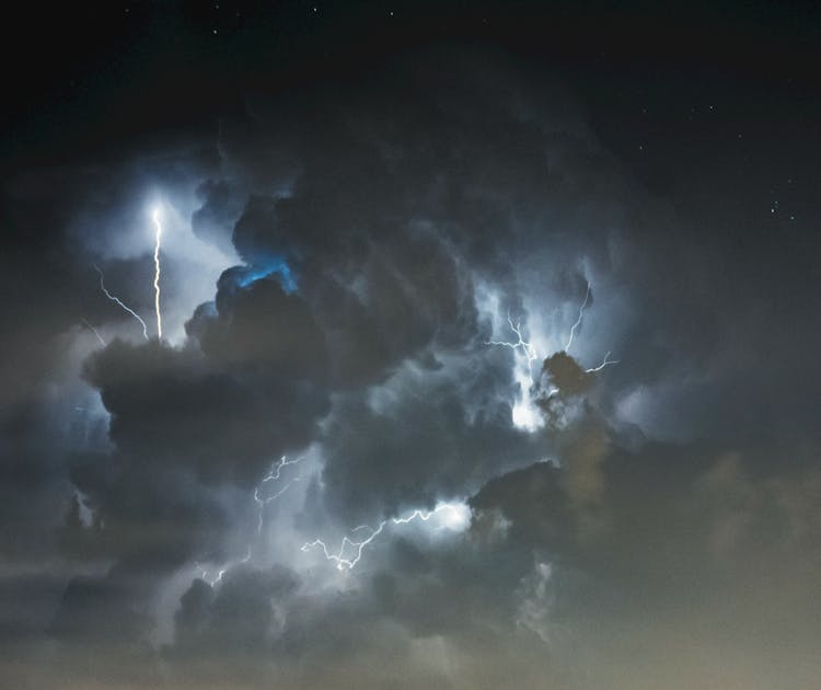 Strikes Of Lightning On Dark Gray Clouds