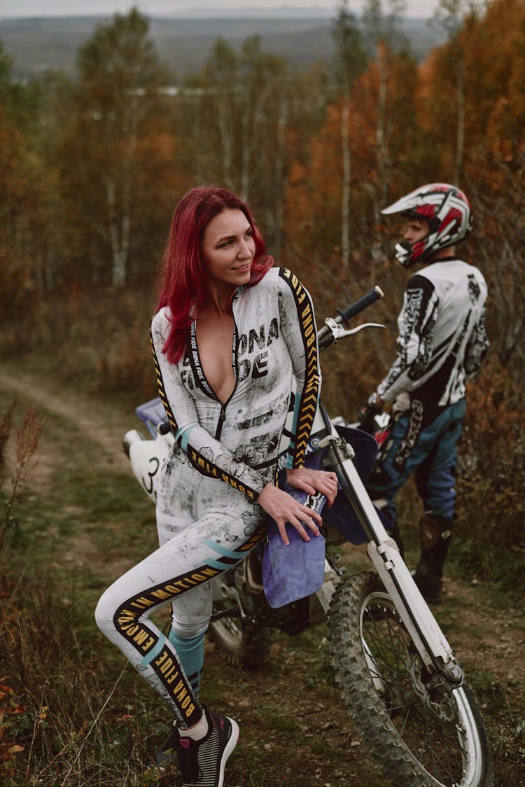 Portrait Of A Woman With A Motorcycle