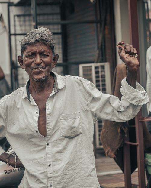 Free A joyful elderly man with arms raised, captured in Pimpri-Chinchwad, India. Stock Photo