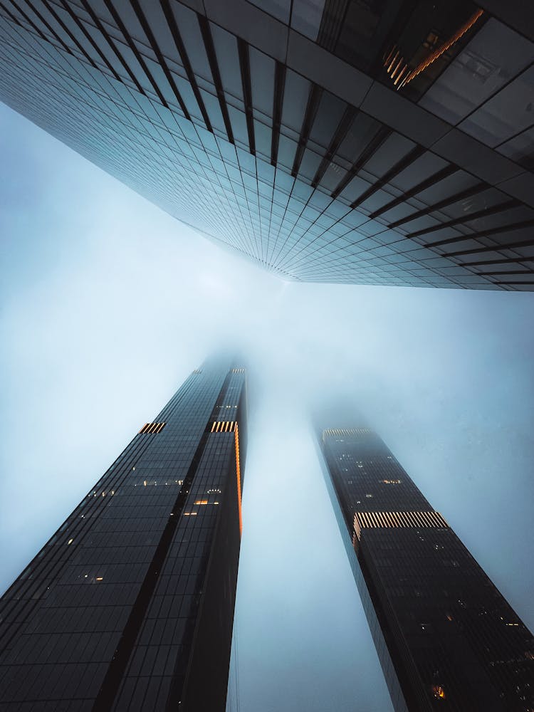 Tops Of City Skyscrapers Diminishing In Smog