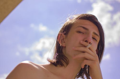 Free Close-up of a Man Smoking Cigarette Stock Photo