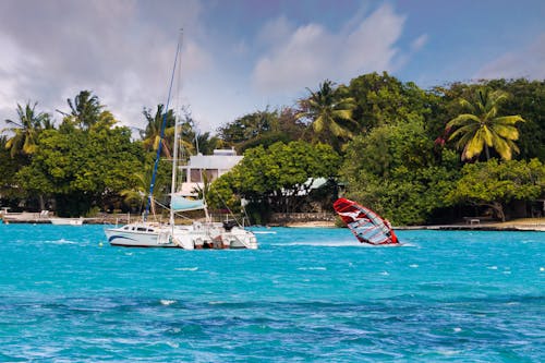 A Boat on a Blue Body of Water