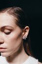 Woman With Silver Stud Earrings