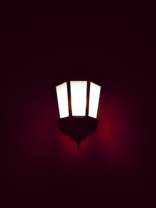 Free A Lamp Mounted on a Wall Stock Photo