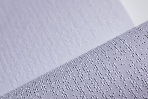 Close-Up Shot of Braille Book