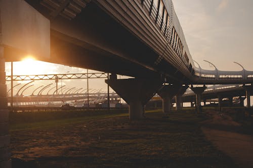 Безкоштовне стокове фото на тему «ґрунтова дорога, залізнична колія, Захід сонця»