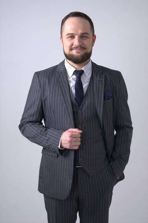 Photo of Man Wearing Pinstripe Suit
