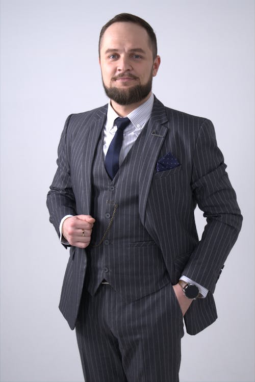 Free Confident Man in Black Pinstripe Suit Jacket Stock Photo